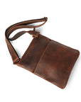 Angled top view of brown crossbody leather bag showing its minimalistic yet practical design and durable Crazy Horse leather.