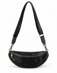 Black leather fanny pack with a gold zipper and gold-tone hardware, featuring an adjustable black shoulder strap.