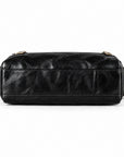 A black leather shoulder bag with a rectangular shape, featuring gold-tone hardware and a matching black leather strap.