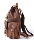 Brown leather backpack with a strap on a white background