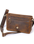 Brown leather crossbody bag on a white background