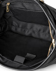Classic black full-grain leather briefcase interior with a zip pocket and fabric organizers