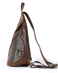 Brown leather sling bag on a white background