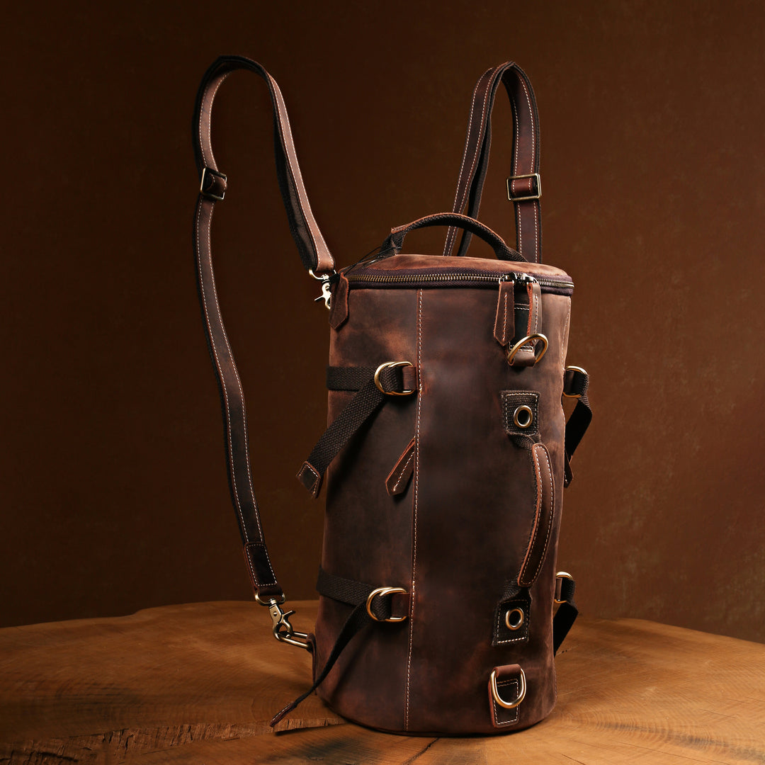 Front view of a vintage handmade leather backpack, showcasing spacious compartments for essentials and travel gear