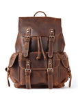 Brown leather backpack on a white background
