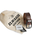 Ravon leather belt presented in a branded Elwards Leather pouch with a product tag, perfect for gifting.
