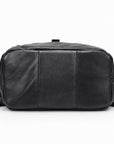 A black leather shoulder bag with a top zipper and a top carry handle, shown against a plain white background.
