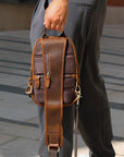 Men’s brown leather sling bag with multiple zip pockets casual style