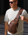 Men’s dark brown leather sling bag crossbody with strap pocket