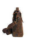 Side view of a handmade dark brown leather bag with adjustable strap and sturdy hardware