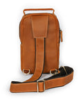 Tan leather sling bag back view with adjustable strap and durable stitching