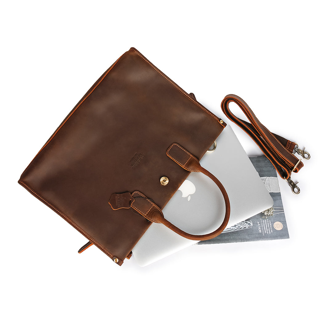 Overhead view of a men's vintage leather work bag showcasing its spacious interior and laptop compartment.