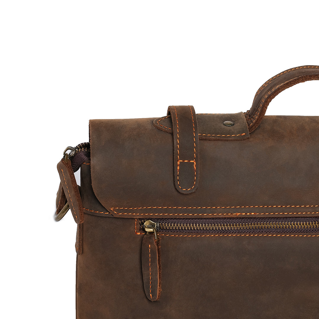 Back view of a handcrafted vintage leather briefcase, highlighting the sturdy zipper pocket and secure flap design.