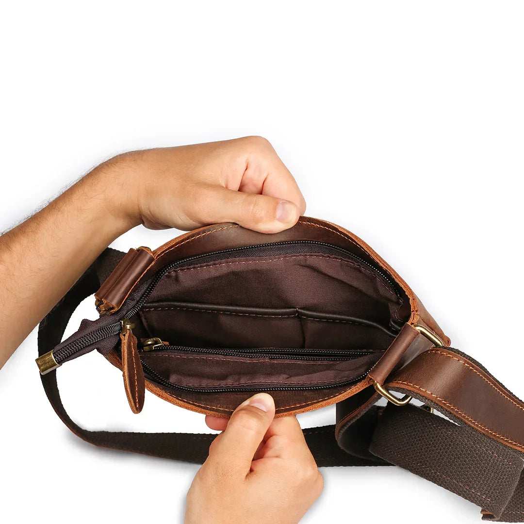 Interior close-up of zippered compartments, emphasizing the bag's secure storage and luxury craftsmanship.