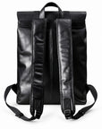 Black full-grain leather backpack, back view