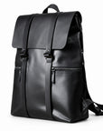 A black full-grain leather backpack with a top flap, two vertical front straps, a front zippered pocket, and a top carry handle.