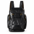 Black full-grain leather backpack with a front flap, twin buckles and stitched front pocket