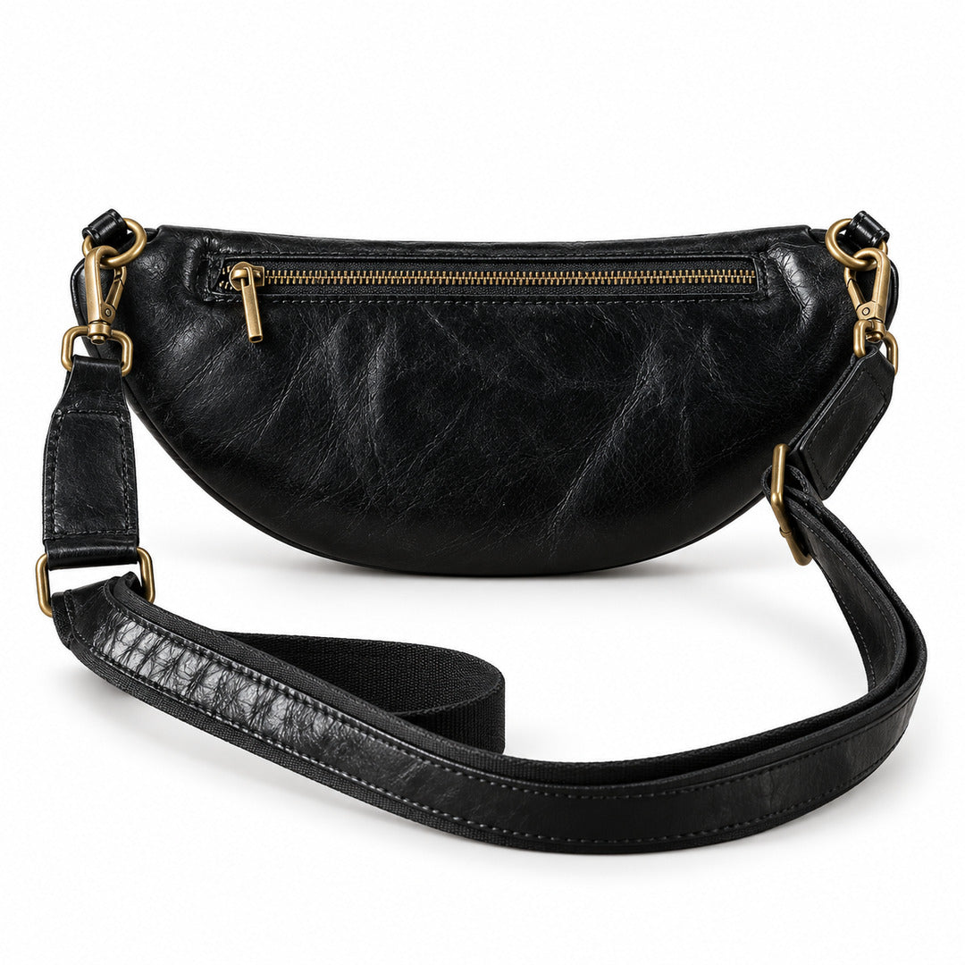 Black leather crescent-shaped crossbody bag with gold-tone hardware and a detachable shoulder strap.