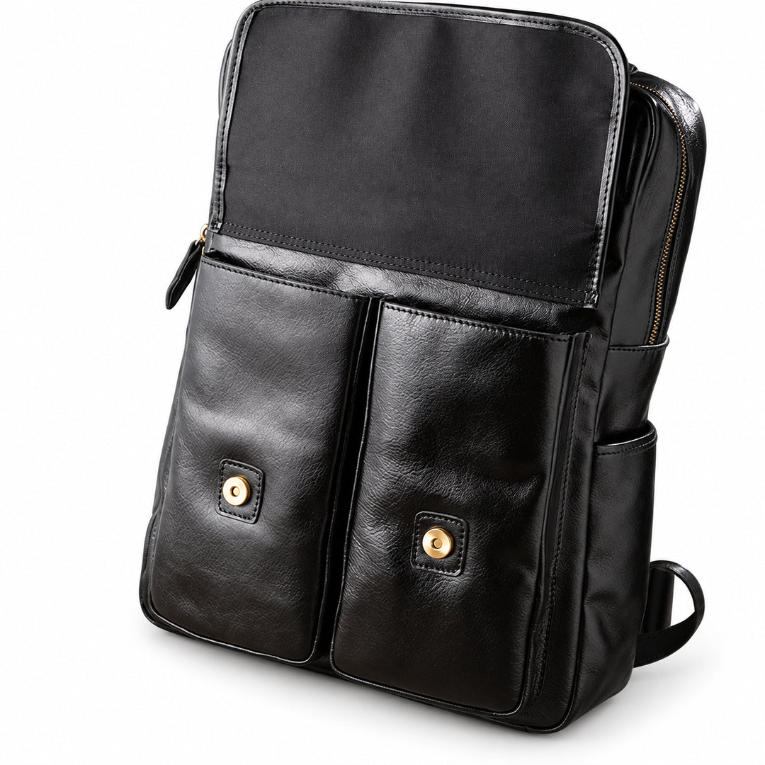 Black faux-leather backpack with two front flap pockets secured by gold-tone snap buttons.