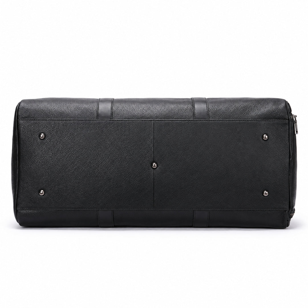 Black textured leather travel bag shown from the back, featuring a pebbled finish, silver-tone metal studs, and a zippered closure on a white background.
