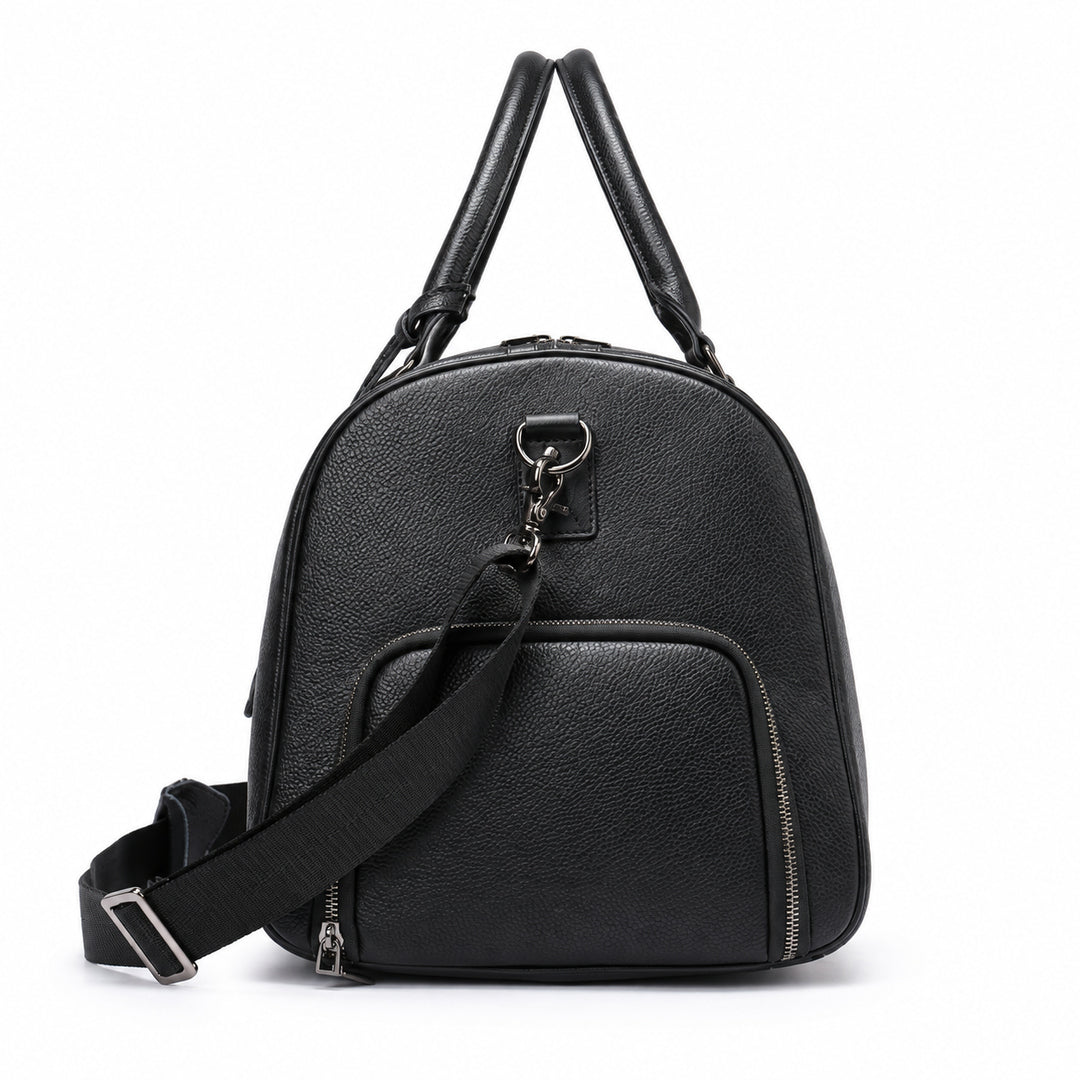 A black pebbled leather backpack with dual top handles, a front zippered pocket, and an adjustable shoulder strap, shown on a plain white background.