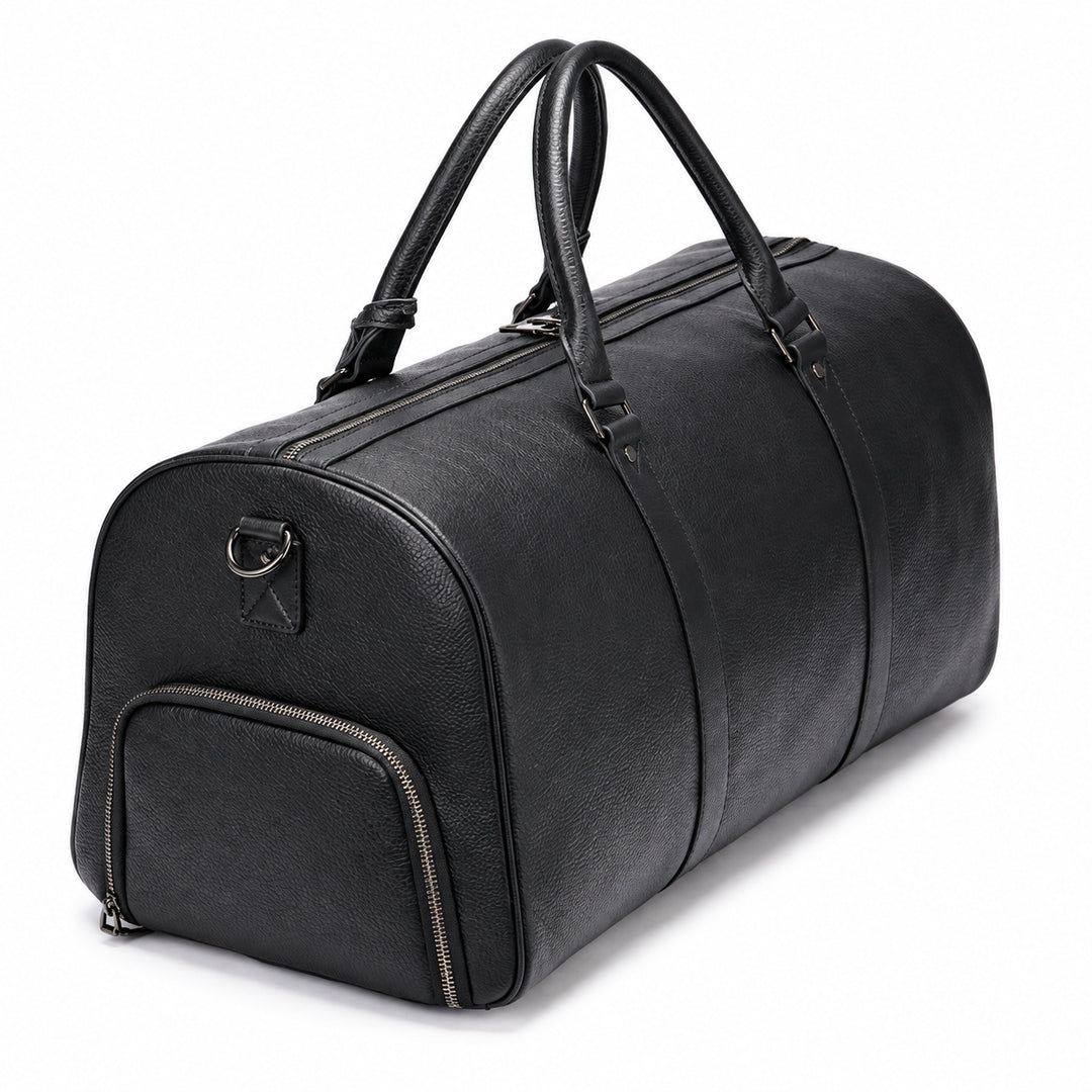 A black pebbled leather duffel bag with dual top handles, a front zippered pocket, and a zippered main compartment, shown on a white background.