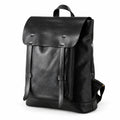 A black leather backpack with a top flap, front strap details, and a top handle.