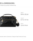 Black leather top-handle crossbody bag with gold-tone hardware.