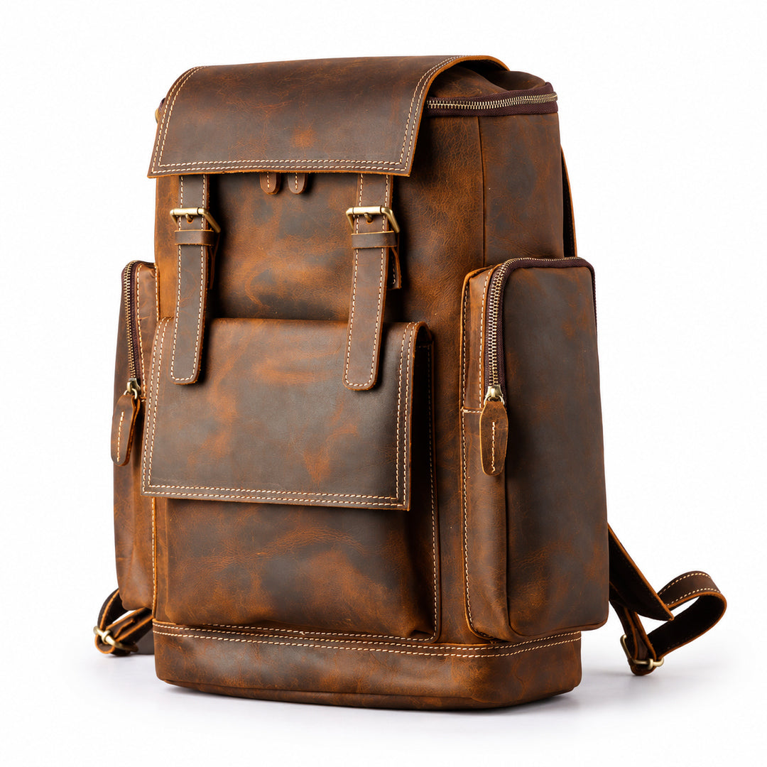 A brown distressed leather backpack with multiple front pockets, brass-tone hardware, and a top flap.