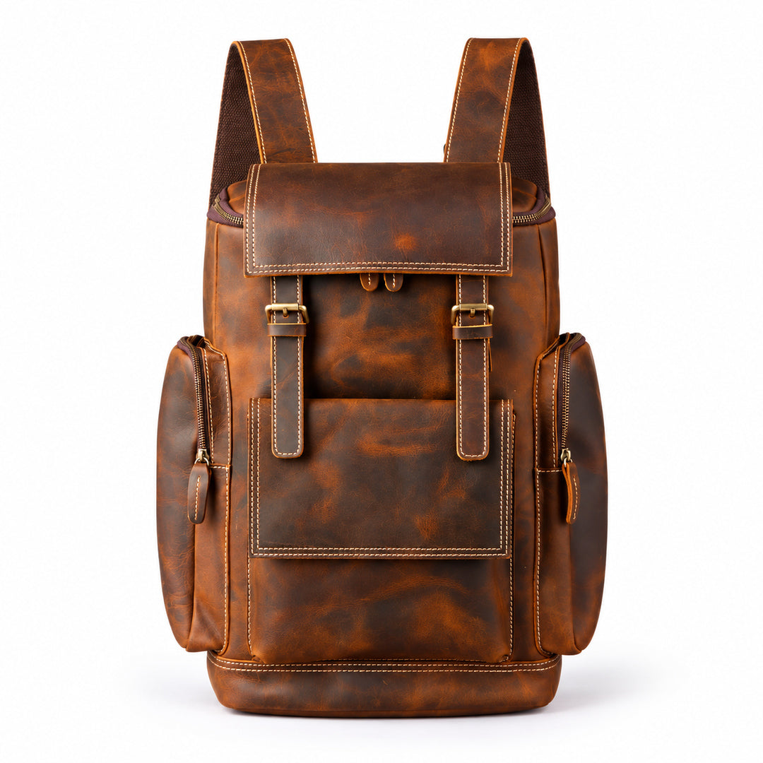 A brown distressed leather backpack with a front flap pocket, side pockets, and brass-tone hardware.