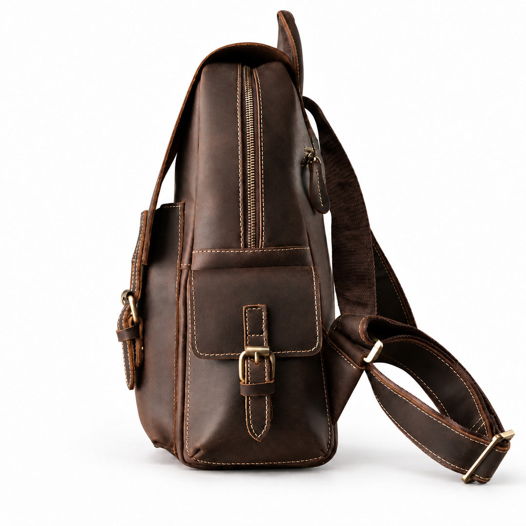 A dark brown leather crossbody bag with a front flap pocket featuring a buckle closure.