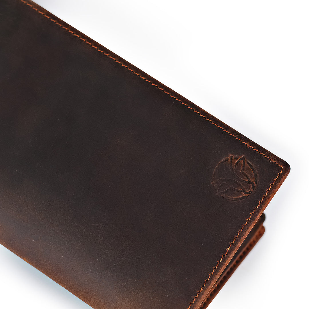 Brown leather wallet with a brand logo on a white background