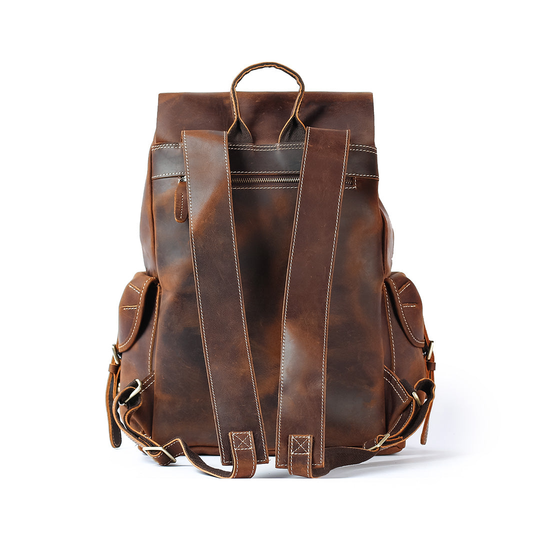 Brown leather backpack on a white background