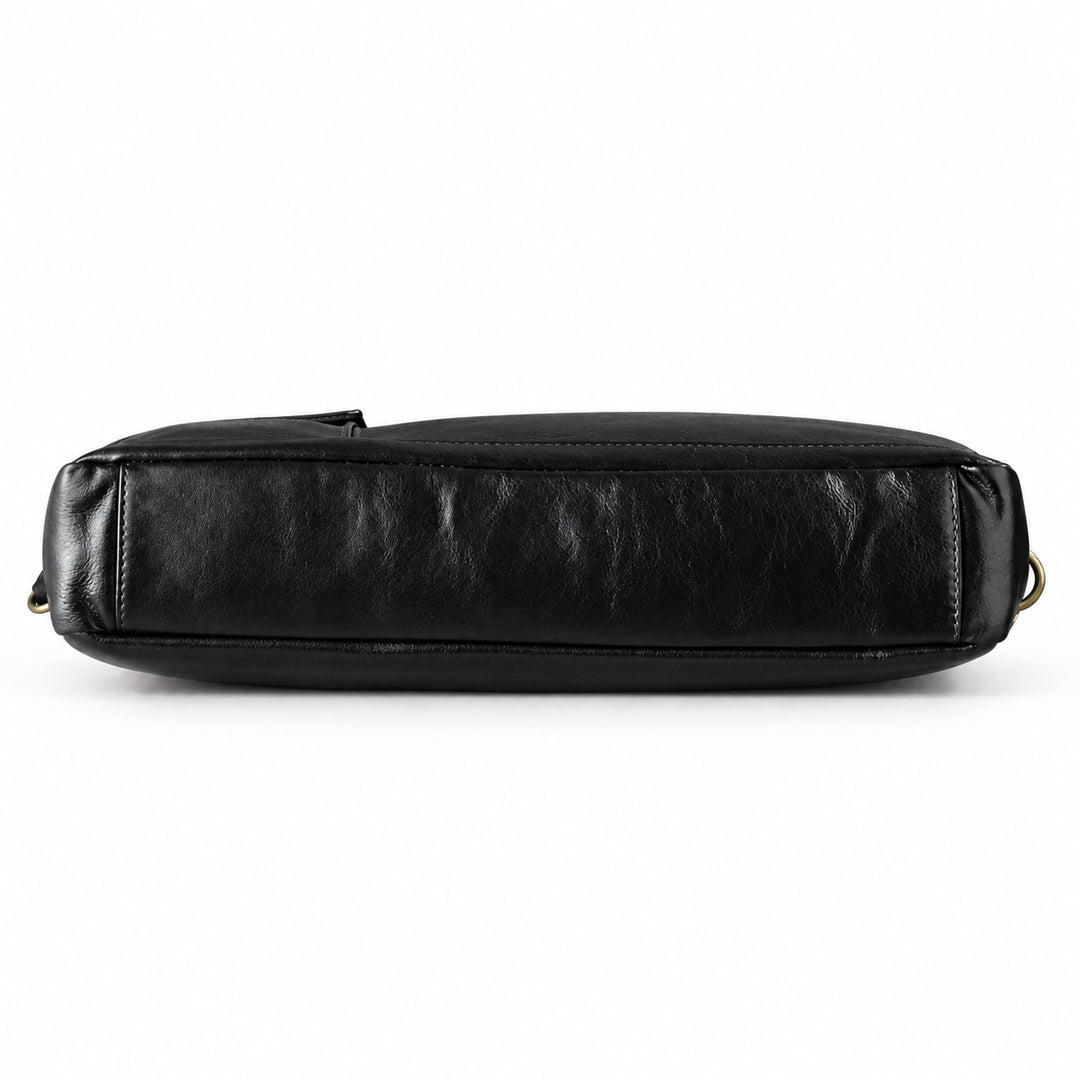 Classic black full-grain leather briefcase base with stitched edges and natural leather folds