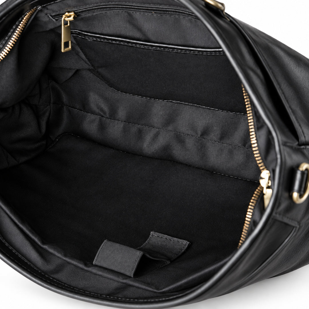 Classic black full-grain leather briefcase interior with a zip pocket and fabric organizers
