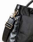 Classic black full-grain leather briefcase shoulder strap with a swivel clasp and metal adjuster