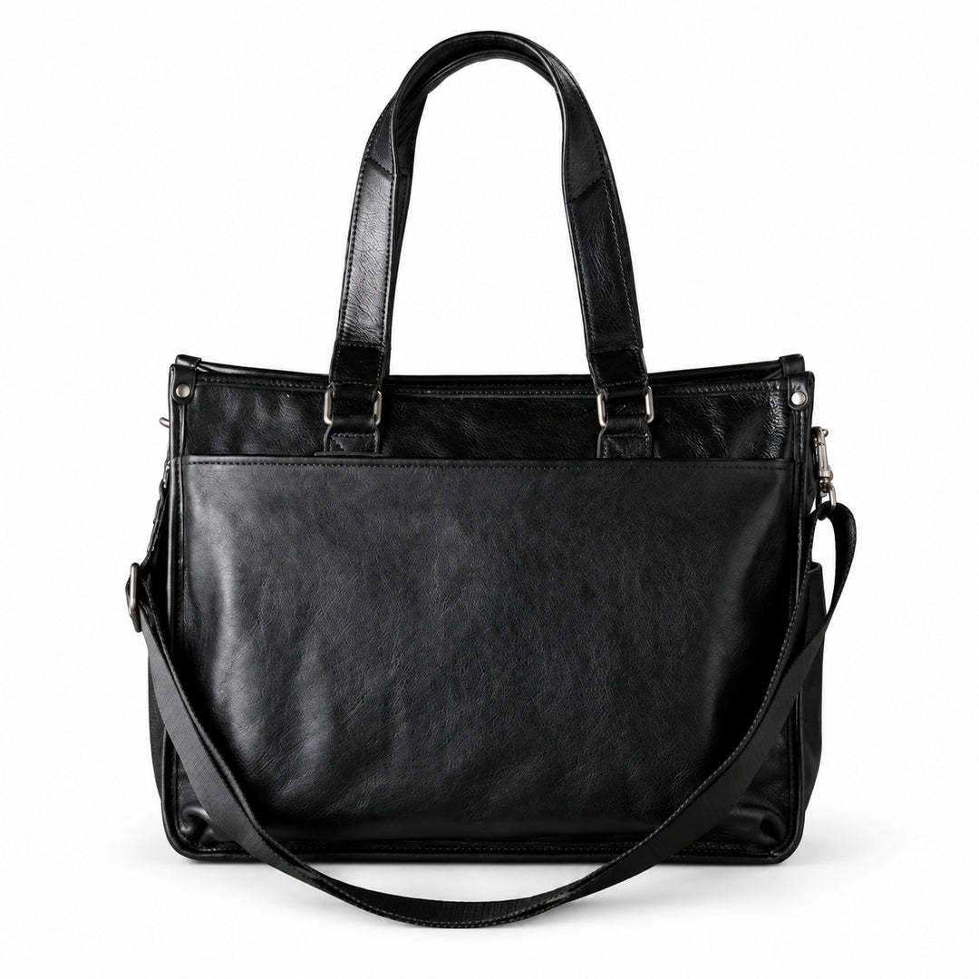 Classic black full-grain leather tote with stitched outer pocket, long handles and draped shoulder strap