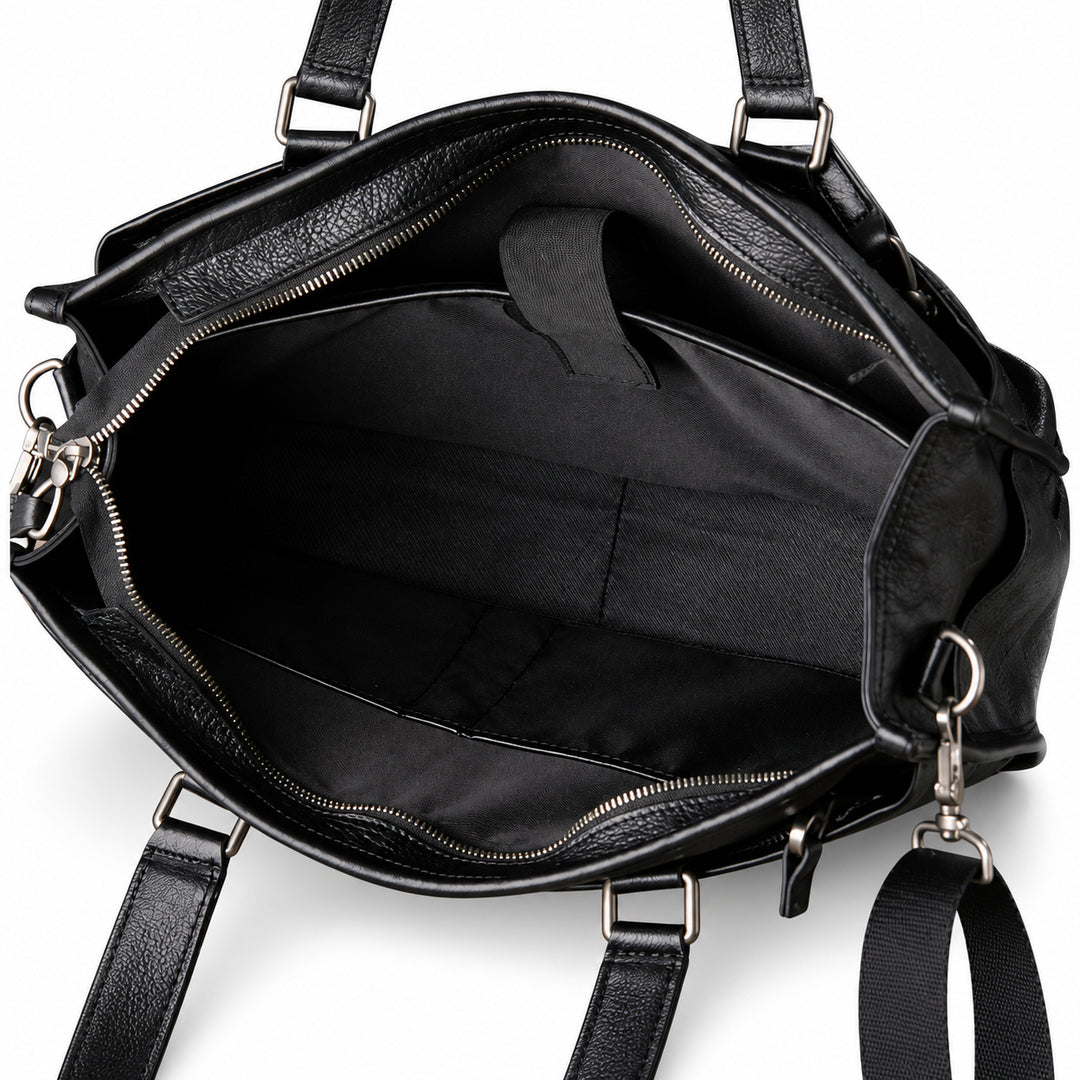 Classic black full-grain leather tote open interior with black lining, an inner sleeve and retaining tab