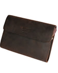 Front angled view of a dark brown men's leather clutch with a sleek flap design, showcasing Crazy Horse leather.