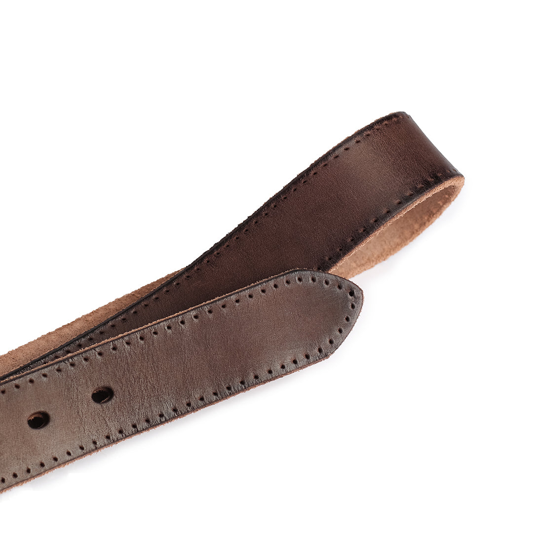 Detailed view of the belt tip showing its high-quality leather finish and craftsmanship.