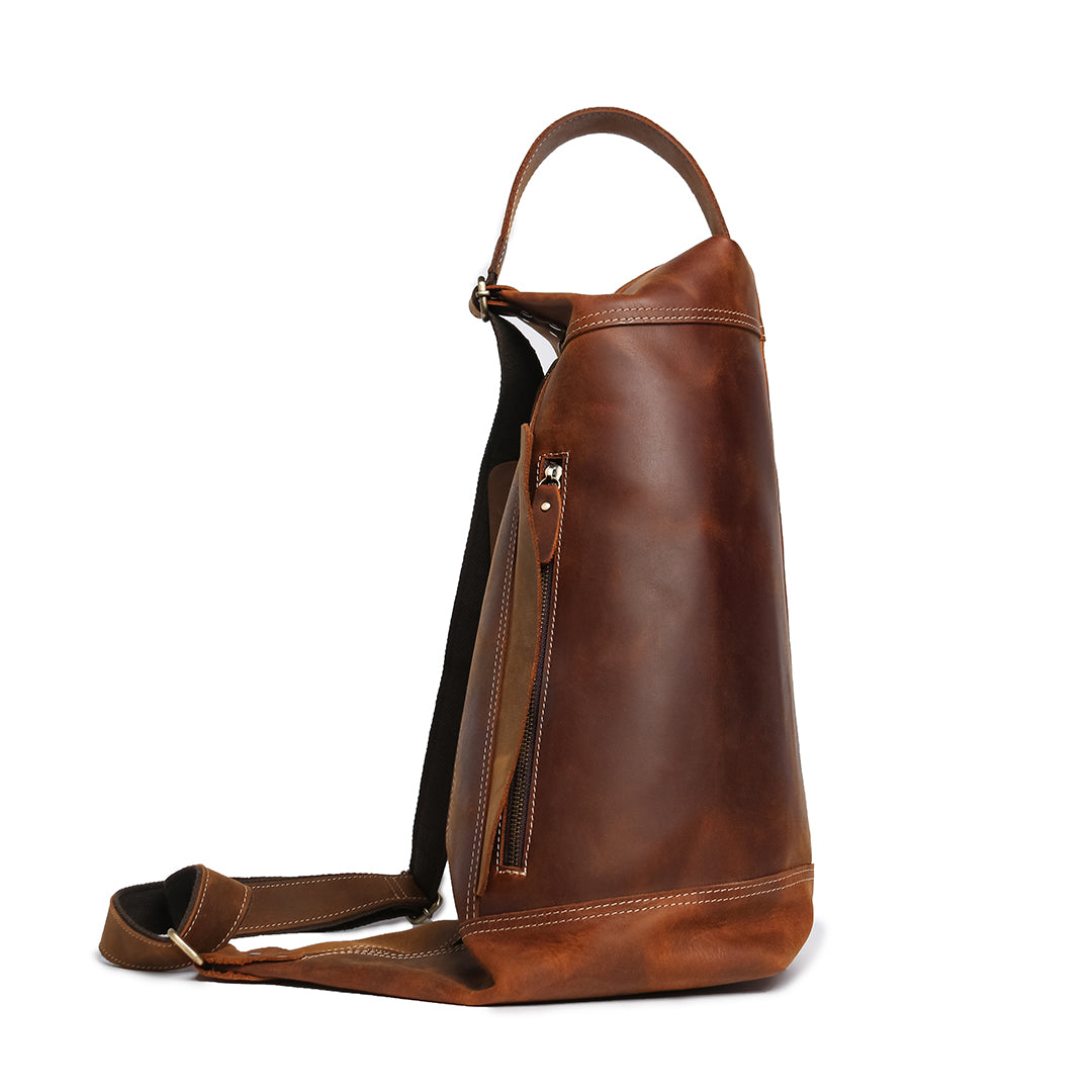 Front view of a stylish leather bag showing a functional zipper pocket and sleek design