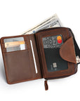 Fully open brown men's leather wallet with card slots, cash compartment, and zippered coin pocket for convenient access.