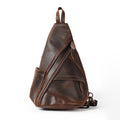Dark brown leather sling bag on a white background