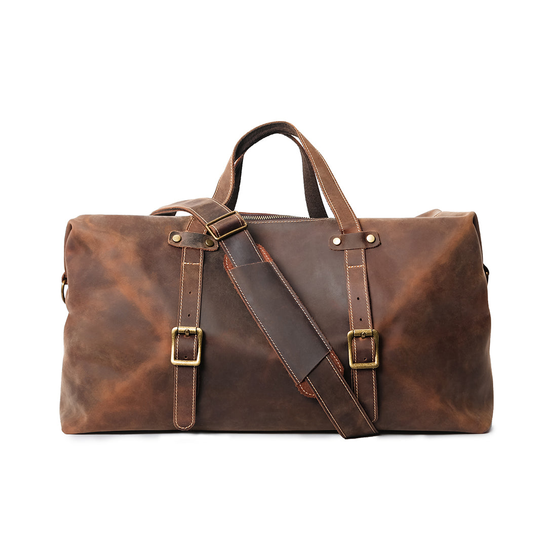 Handcrafted vintage leather duffle bag in front view, featuring premium Crazy Horse leather and durable brass hardware.