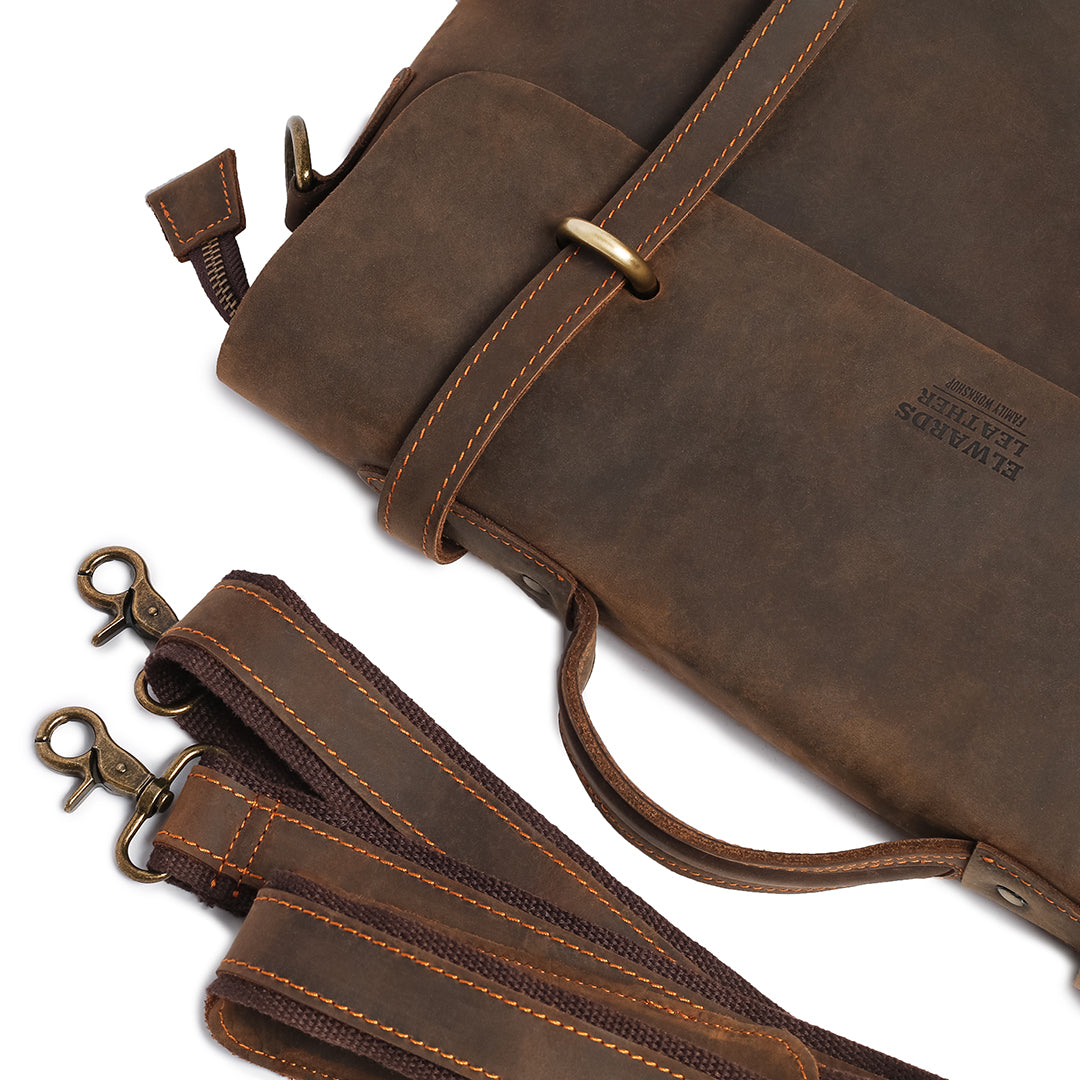 Detailed view of a dark brown leather messenger bag with detachable strap and premium stitching.