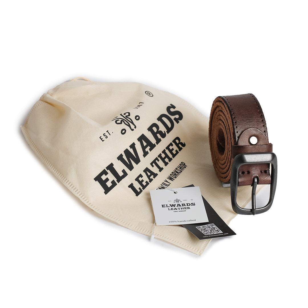 Ravon leather belt presented in a branded Elwards Leather pouch with a product tag, perfect for gifting.