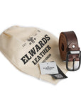 Ravon leather belt presented in a branded Elwards Leather pouch with a product tag, perfect for gifting.