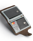 Leather card holder displaying stored credit cards in transparent sleeves, perfect for travel and business.