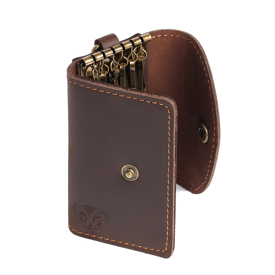 Closed view of a handcrafted Crazy Horse leather key case, highlighting its seamless stitching and rich brown color.