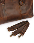 Premium leather shoulder strap for a duffle bag with shoe compartment, detachable and adjustable for easy carrying.